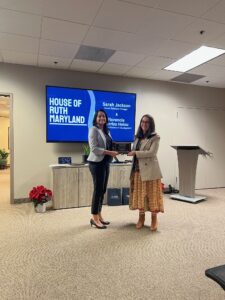 Gallagher associate Sangeetha Kannan being presented a pro bono award by Gallagher Associate Sarah Simmons. 